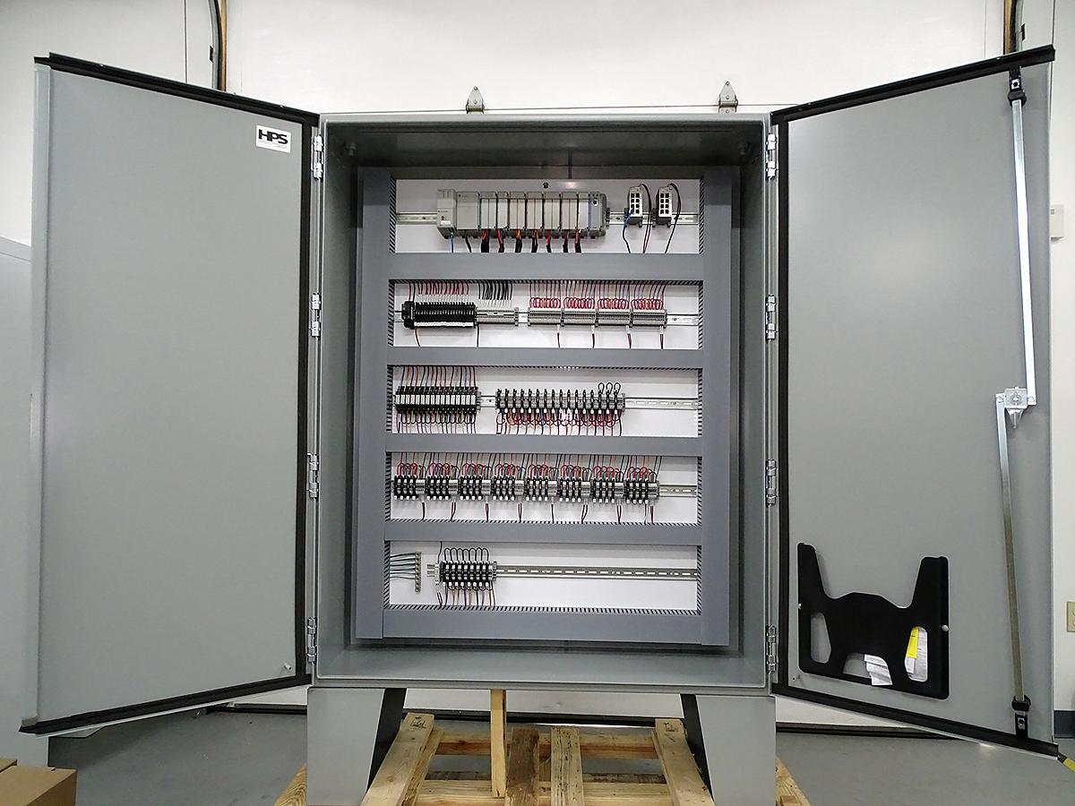 Open control enclosure on a pallet, ready to ship