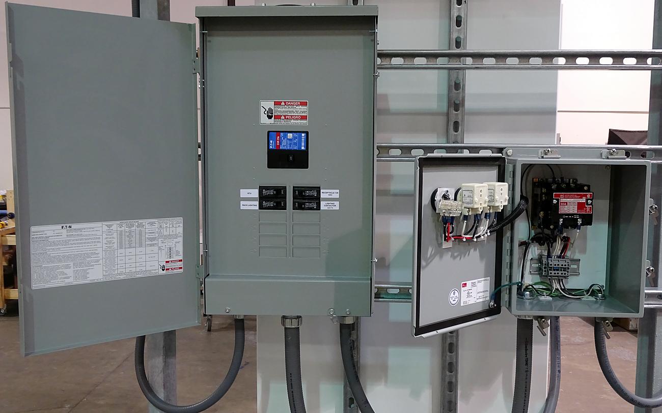 Panelboard with motor-starter enclosure